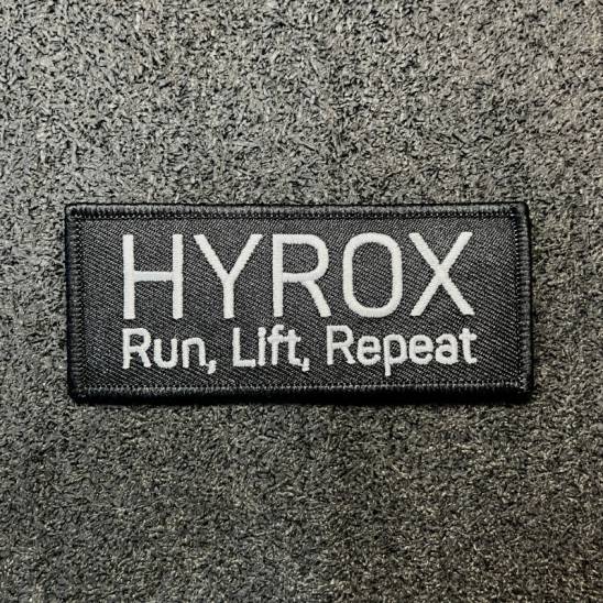 Nášivka HYROX se suchým zipem - Run, Lift, Repeat - bílý nápis